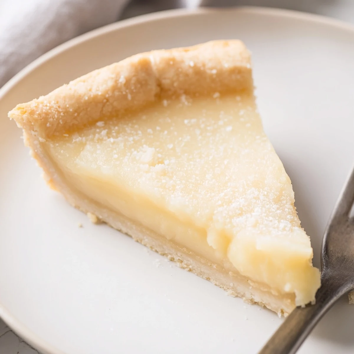 Creamy water pie baked until golden, topped with buttery, sugary goodness.