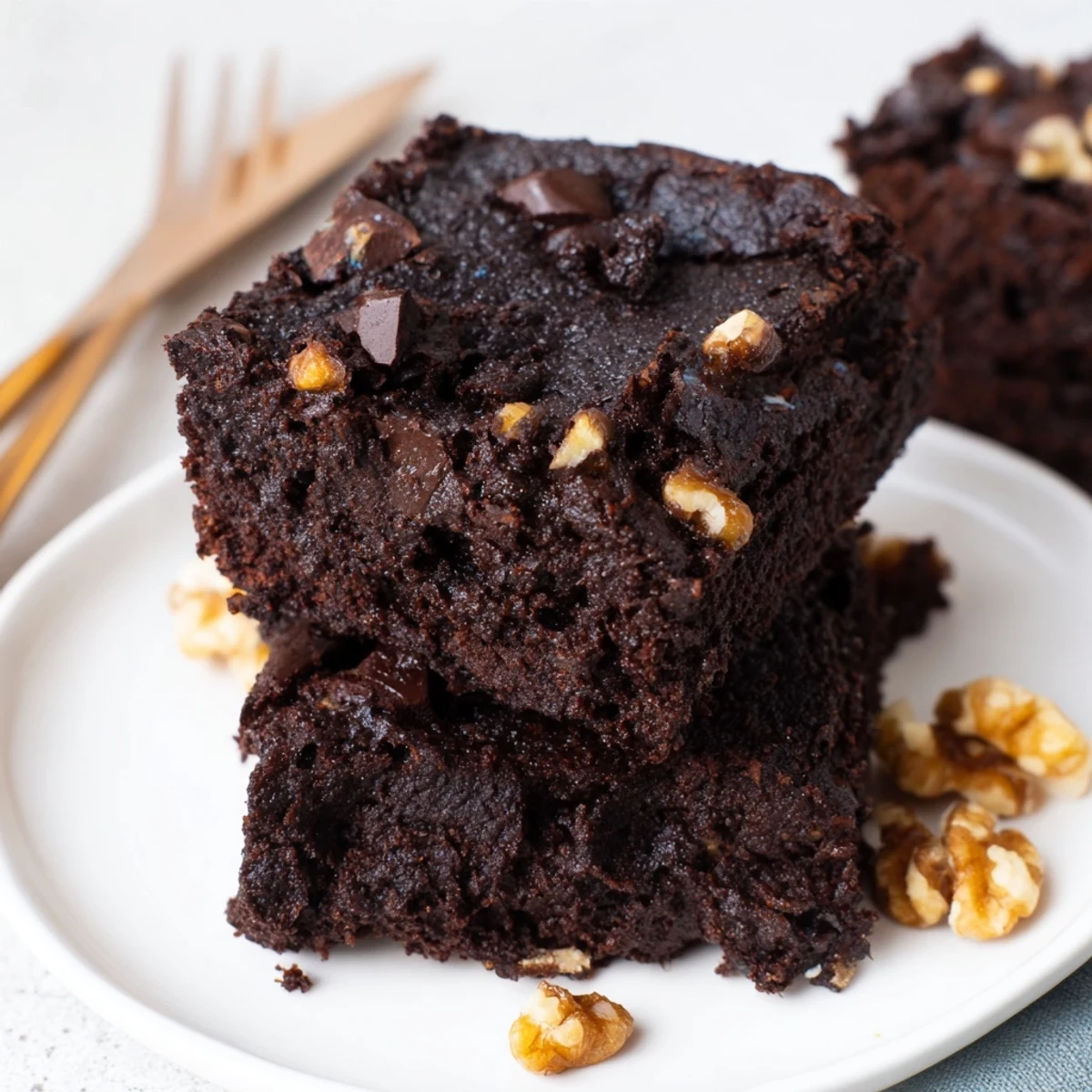 Rich, fudgy brownies using nut-milk pulp, served warm with ice cream.  