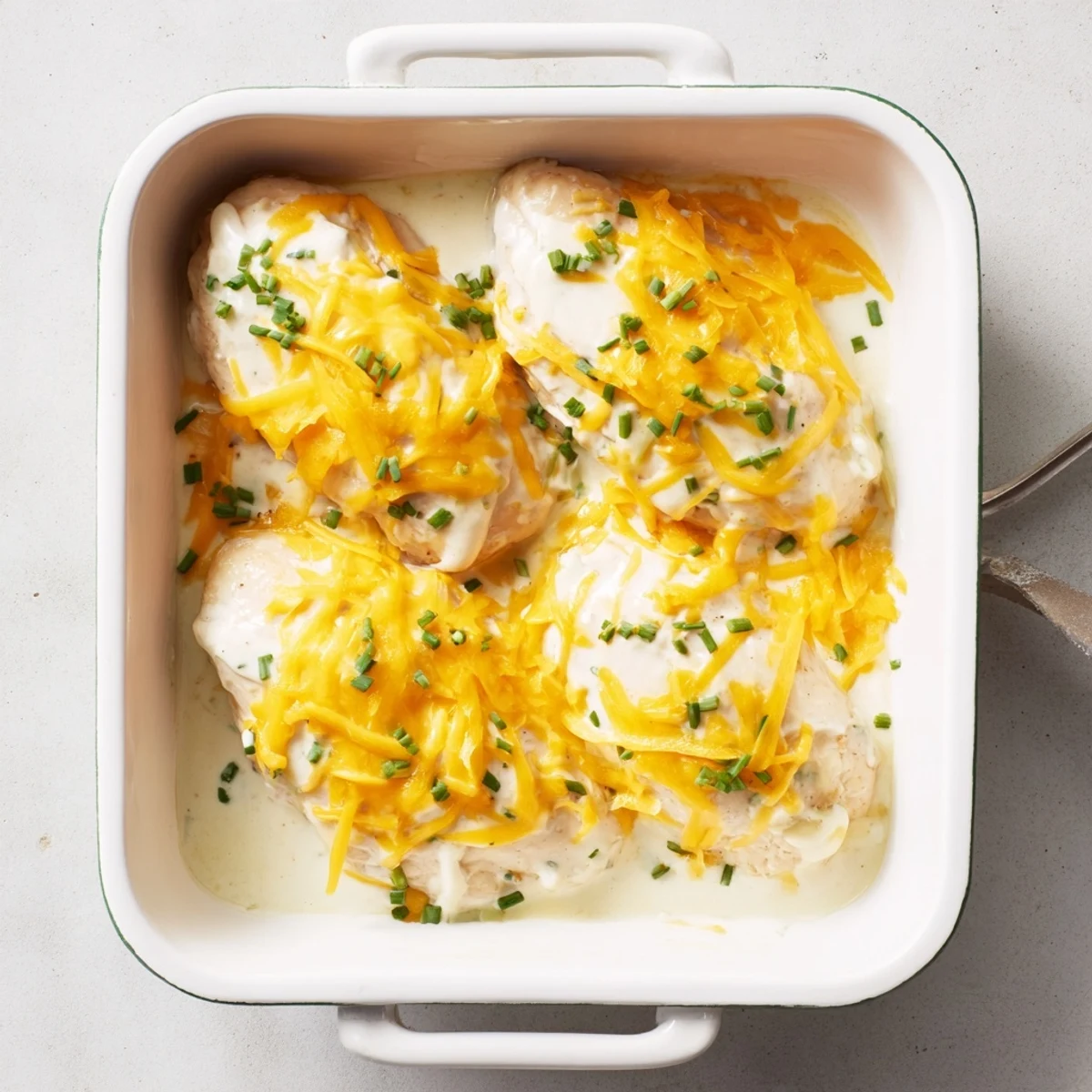 Juicy chicken breasts smothered in ranch and cheddar for a comforting dinner.  