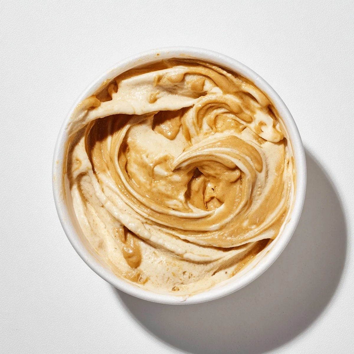 Frozen banana chunks blended with peanut butter, forming a delightful peanut butter banana ice cream.