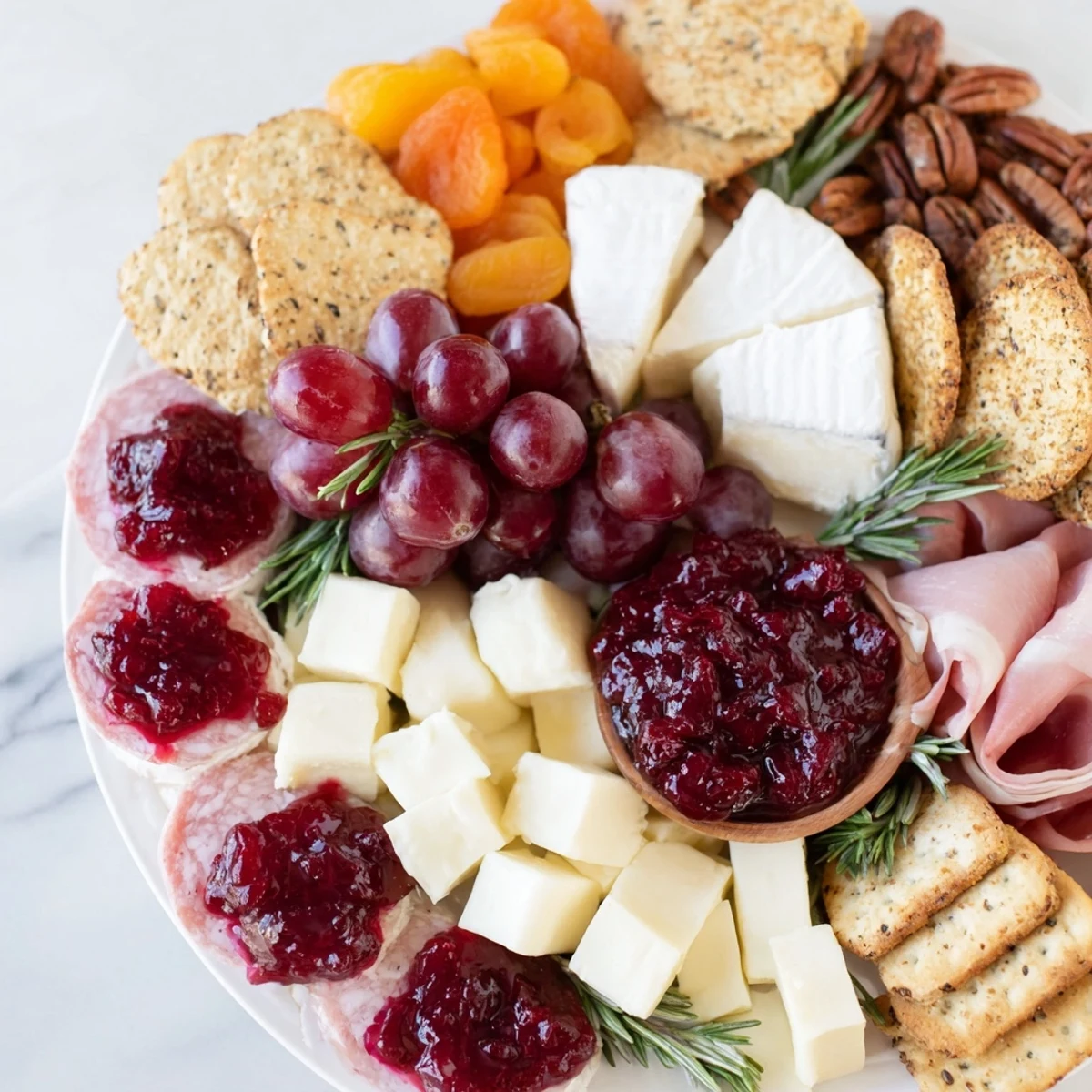 Visualizing this Cranberry Wreath Platter reveals a stunning holiday appetizer, featuring sweet cranberries and savory treats.