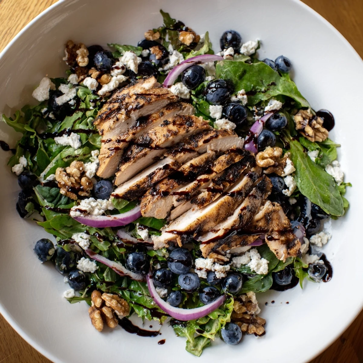 Blueberry Goat Cheese Chicken Salad, a refreshing salad with colorful berries and creamy goat cheese.