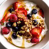 This colorful Cottage Cheese Hot Honey Bowl presents a sweet and spicy breakfast or snack option.