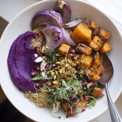 A comforting Spiced Winter Bowl filled with roasted vegetables and vibrant toppings.  