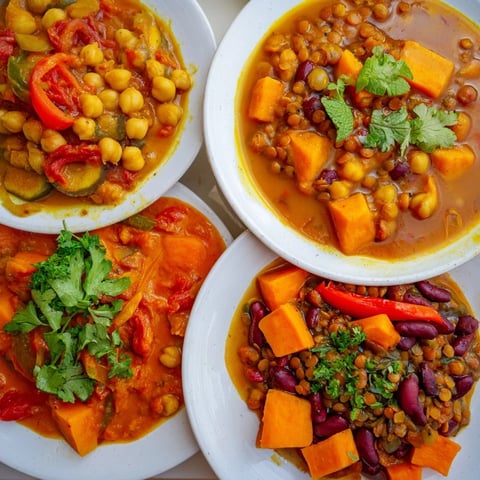A colorful display of single-pan global curries, showcasing vibrant spices and ingredients.  