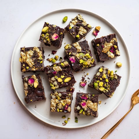 Decadent chocolate bar inspired creations topped with spiced date caramel and pistachios.  