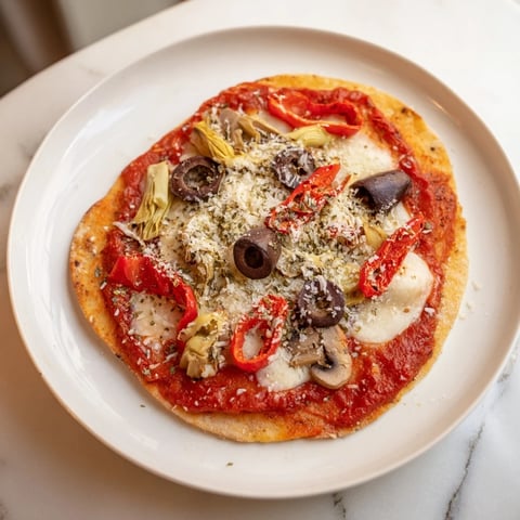 Crispy tortilla pizza, a fast and easy meal with melted cheese and fresh pantry toppings.