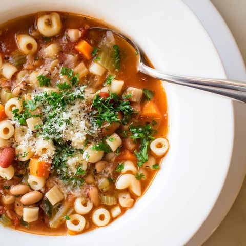 Pasta e Fagioli Soup simmering with beans and pasta, ready for a comforting bowl.