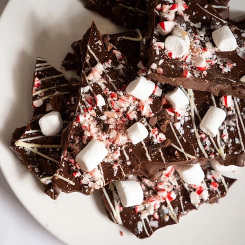Irresistible Hot Chocolate Bomb Bark, speckled with marshmallows and sprinkles, ready for gifting or serving.
