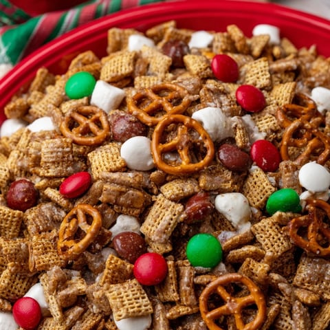 Golden, crunchy Holiday Mix coated in sweet and savory flavors, ready to enjoy.