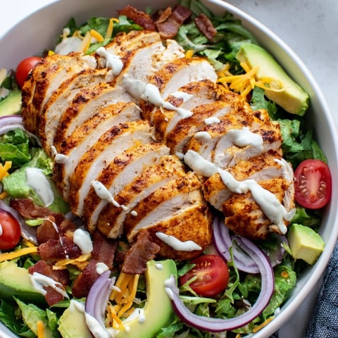 Crispy Bacon Chicken Salad with juicy chicken, crunchy bacon, and fresh greens, drizzled with creamy ranch.