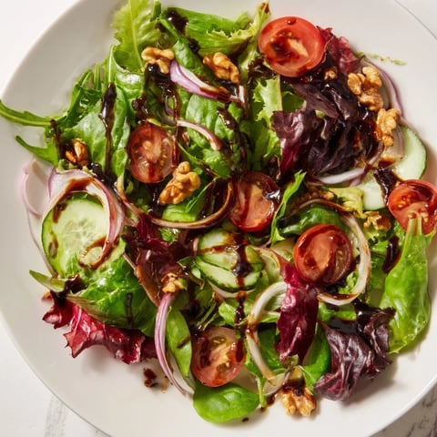 Vibrant quick Balsamic Vinegar Salad, tossed in glossy balsamic dressing with fresh, colorful ingredients.