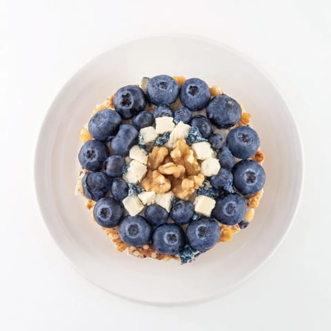 Vibrant image shows The Olympic Rings Interlock appetizer, featuring artfully arranged, colorful food rings for a party.