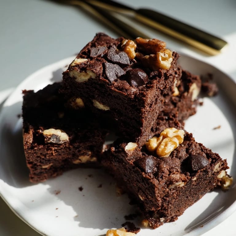 Soft and chewy brownies made with nut-milk pulp for a guilt-free treat.