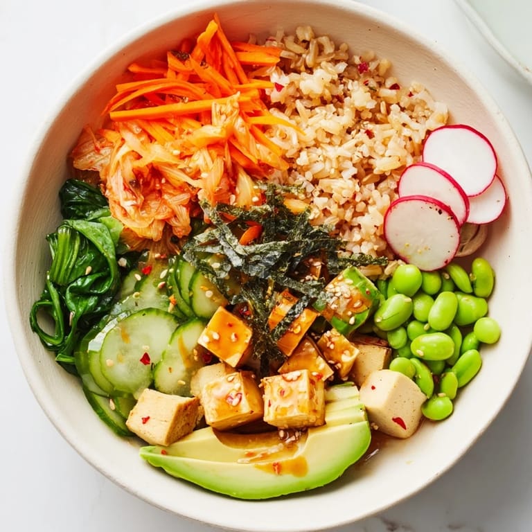 Wholesome Fermented Vegetable Bowl decorated with chopped kimchi, crunchy carrots, and sesame seeds.
