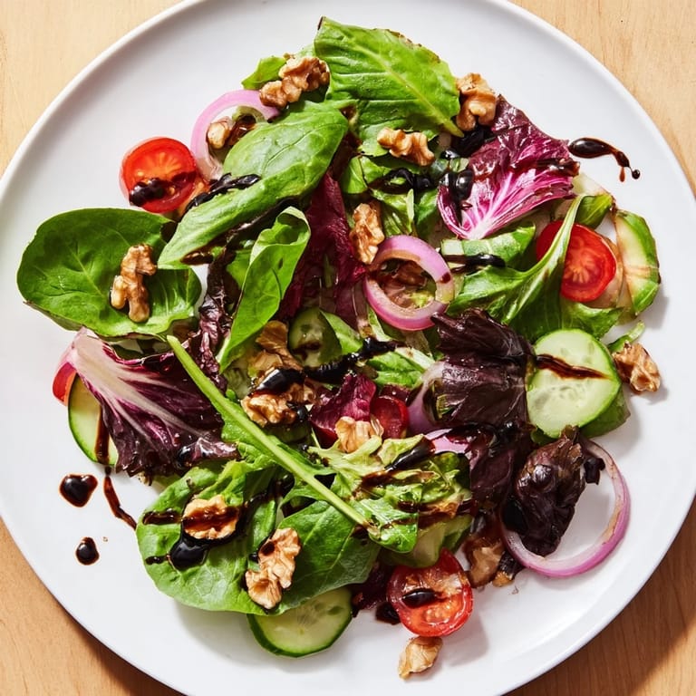 Fresh and flavorful, enjoy this quick Balsamic Vinegar Salad bursting with juicy tomatoes and greens.