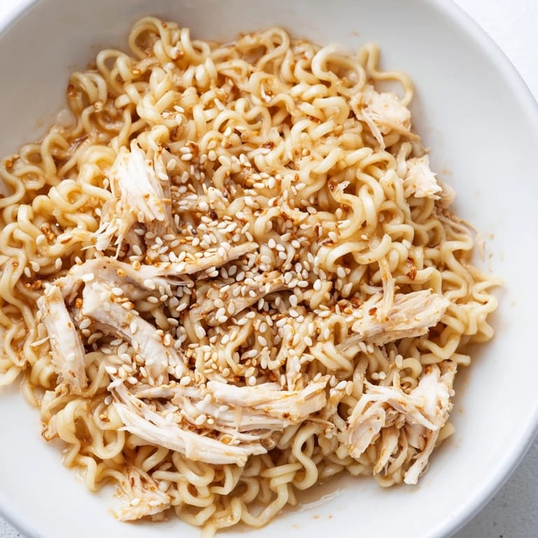 Vibrant Crunchy Ramen Chicken Salad with crisp vegetables and crushed ramen noodles, ready for a quick lunch or potluck.