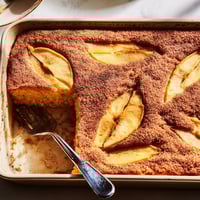 Golden Baked Apple Cake with cinnamon-spiced apple slices, fresh from the oven and served warm for a cozy breakfast.