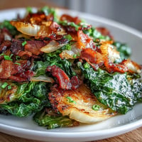 Golden fried cabbage with bacon and onions, a Southern comfort side.